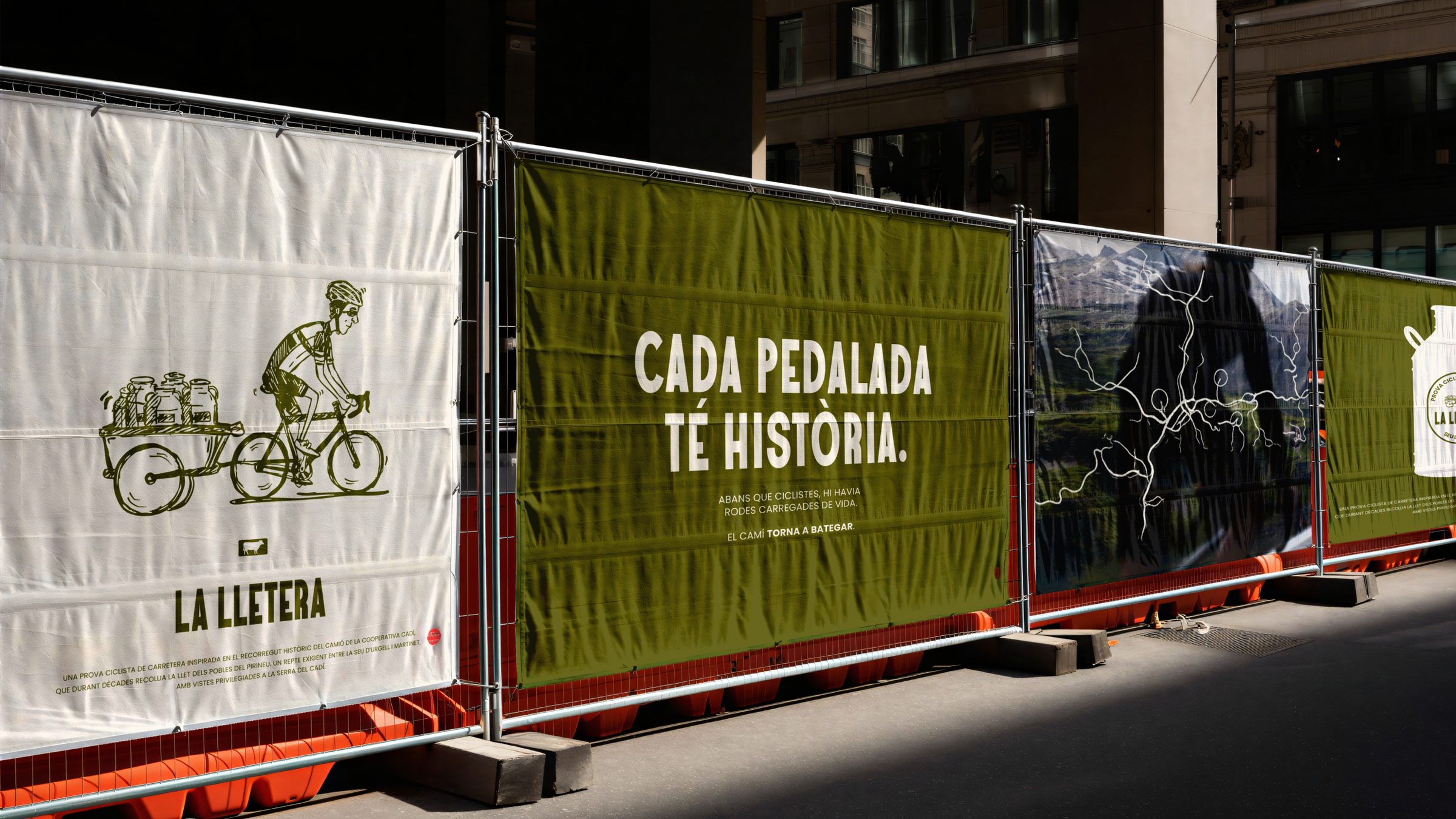 La Lletera banners on a fence: Cada pedalada té història